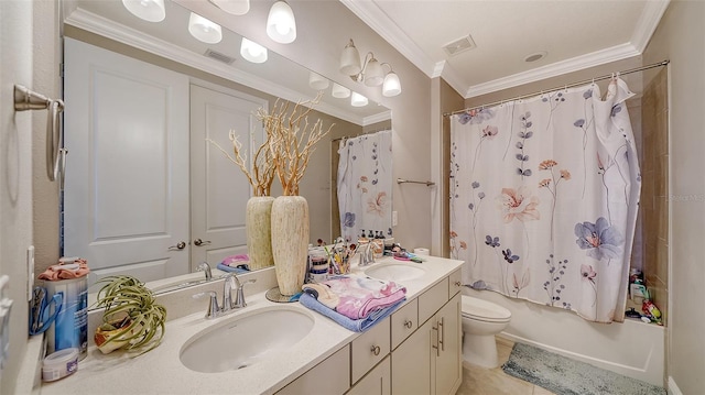 bathroom featuring a sink, visible vents, and crown molding