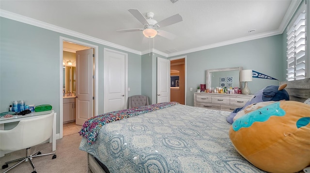 bedroom with light carpet, ensuite bathroom, a ceiling fan, and ornamental molding