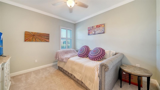 bedroom with light colored carpet, crown molding, and baseboards