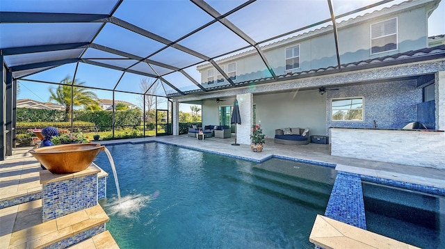 outdoor pool featuring area for grilling, a ceiling fan, a patio, an outdoor hangout area, and a lanai