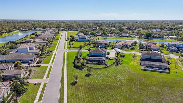 aerial view featuring a residential view and a water view