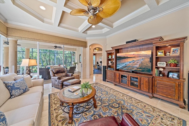 living room with a ceiling fan, coffered ceiling, arched walkways, ornamental molding, and a towering ceiling