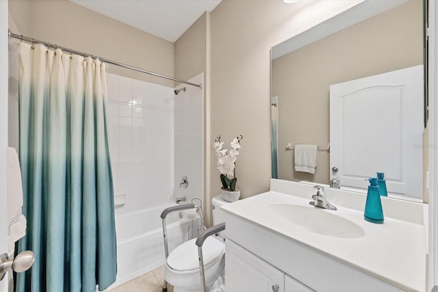 bathroom with vanity, tile patterned floors, toilet, and shower / bath combo