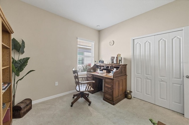 office area with baseboards and carpet floors