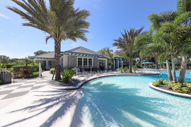 pool with a patio area