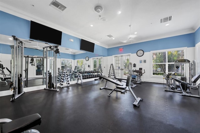 exercise room with visible vents, french doors, baseboards, and ornamental molding