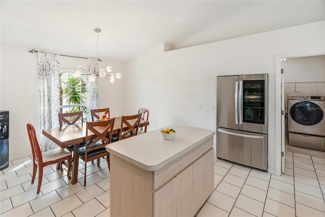 kitchen with light brown cabinetry, light countertops, light tile patterned floors, smart refrigerator, and washer / clothes dryer