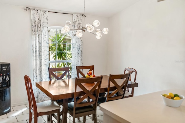 dining room with a notable chandelier and light tile patterned flooring