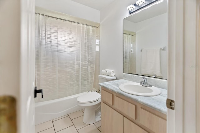 full bath with vanity, tile patterned floors, toilet, and shower / tub combo with curtain