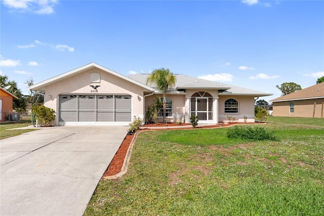 ranch-style home featuring stucco siding, an attached garage, concrete driveway, and a front lawn