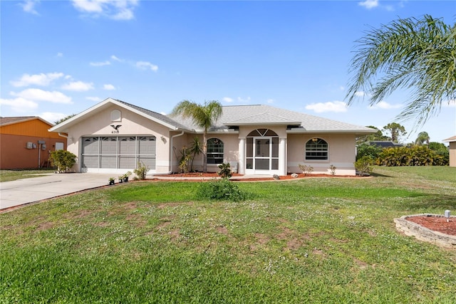 ranch-style house with stucco siding, a front yard, an attached garage, and driveway