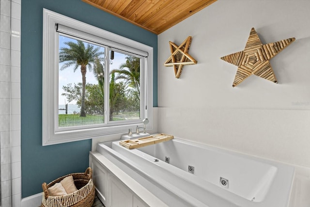 full bathroom featuring wood ceiling and a whirlpool tub