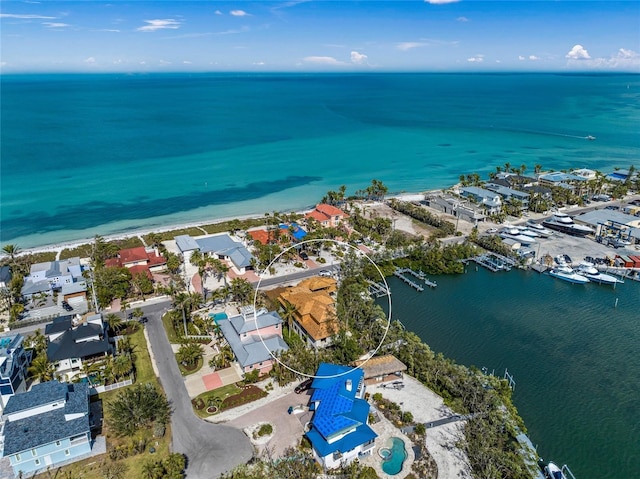 birds eye view of property featuring a residential view and a water view