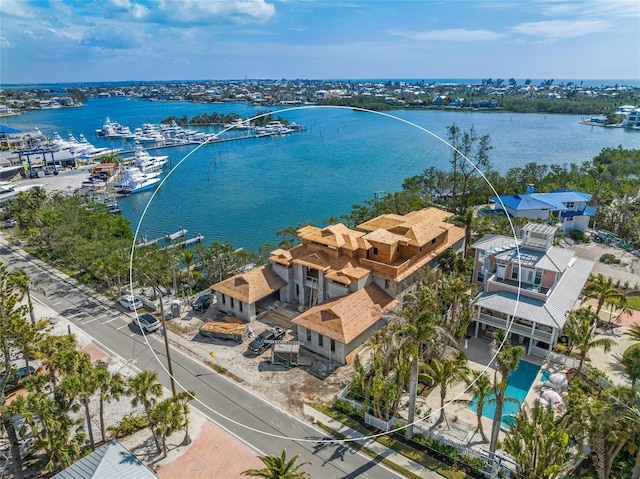 birds eye view of property featuring a water view