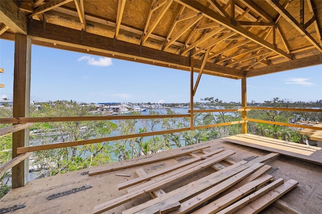 wooden deck with a water view