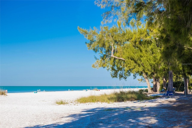 view of water feature with a beach view