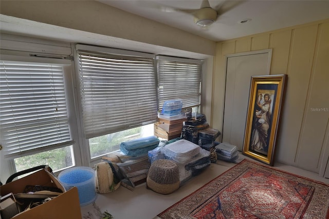 sitting room featuring a ceiling fan