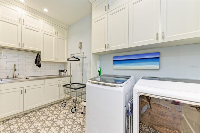 516 Kumquat Dr, Anna Maria, FL 34216 - washroom with cabinet space, independent washer and dryer, and recessed lighting