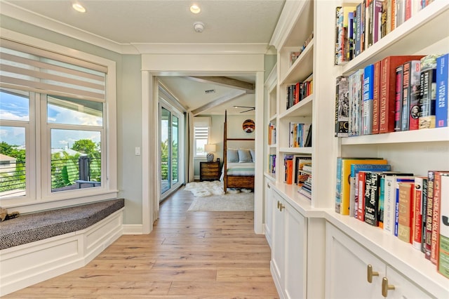 516 Kumquat Dr, Anna Maria, FL 34216 - corridor with light wood-style floors, recessed lighting, built in features, and crown molding
