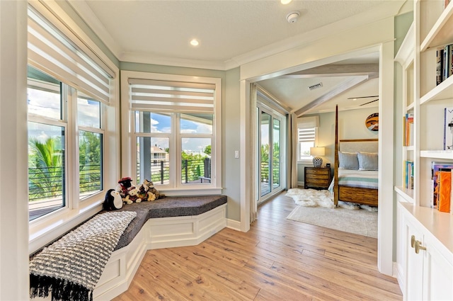 516 Kumquat Dr, Anna Maria, FL 34216 - sitting room featuring light wood finished floors, crown molding, lofted ceiling, and recessed lighting
