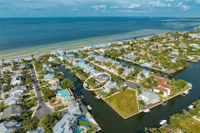 516 Kumquat Dr, Anna Maria, FL 34216 - aerial perspective of suburban area with a large body of water
