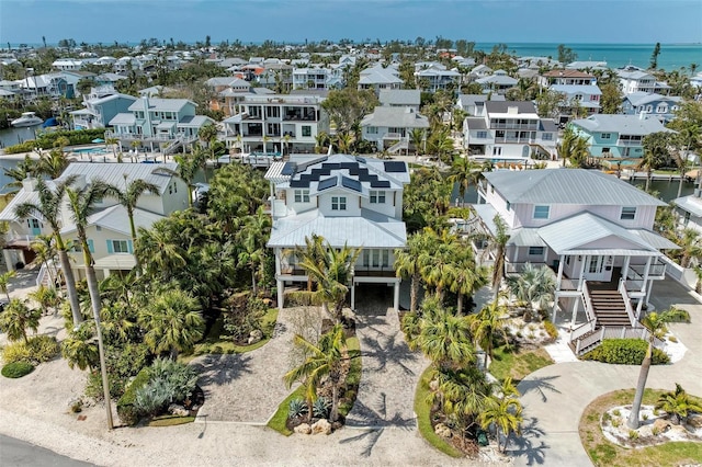 516 Kumquat Dr, Anna Maria, FL 34216 - aerial perspective of suburban area with a large body of water