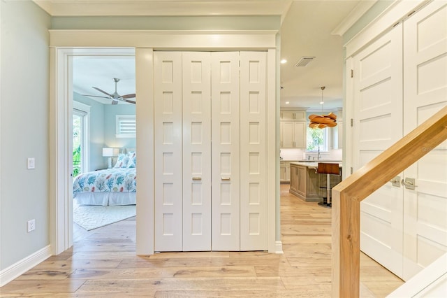 516 Kumquat Dr, Anna Maria, FL 34216 - foyer entrance with light wood-style floors, ceiling fan, and recessed lighting
