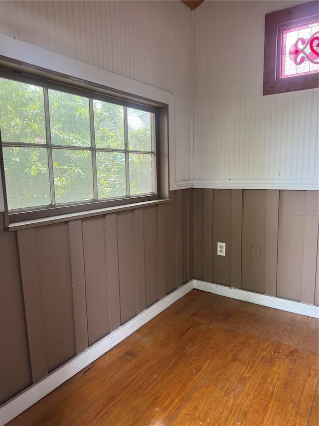 unfurnished room featuring wood finished floors