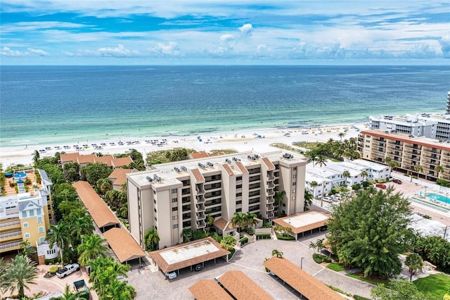 aerial view with a view of the beach and a water view