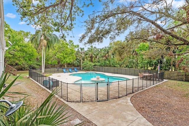 view of pool with a patio, a fenced in pool, and fence