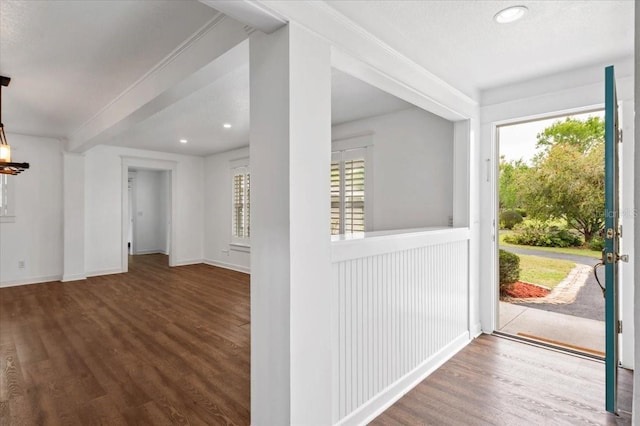 entrance foyer with recessed lighting, baseboards, wood finished floors, and crown molding