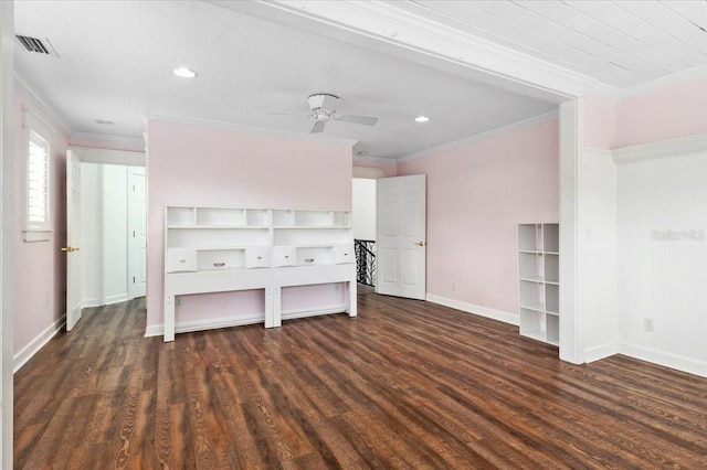 interior space featuring baseboards, a ceiling fan, wood finished floors, and crown molding