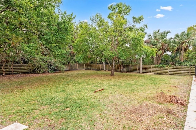 view of yard featuring fence