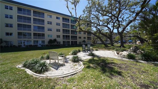 view of community with a yard