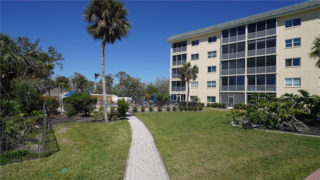 surrounding community featuring a lawn