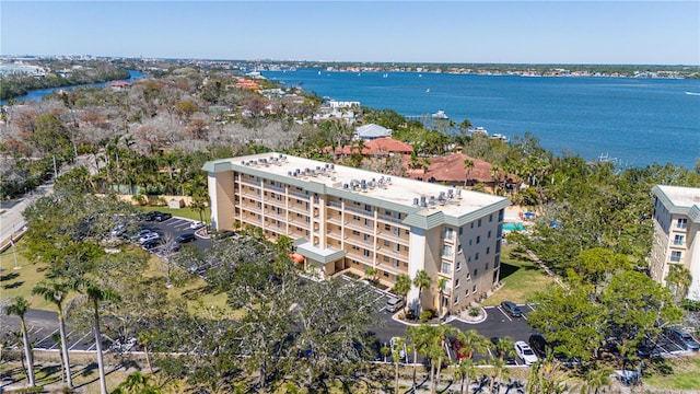 birds eye view of property featuring a water view