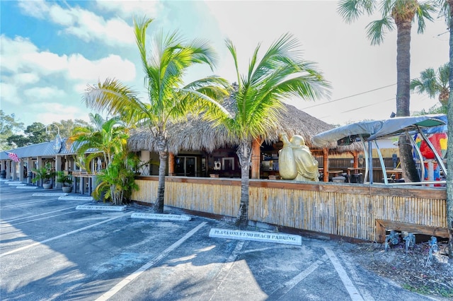8625 Midnight Pass Rd Unit 305B, Siesta Key, FL 34242 - view of property featuring uncovered parking