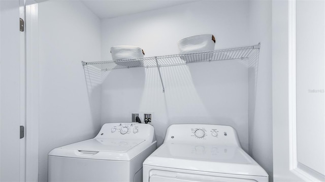 laundry room featuring laundry area and washer and clothes dryer