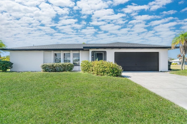 single story home featuring stucco siding, a garage, and a front lawn