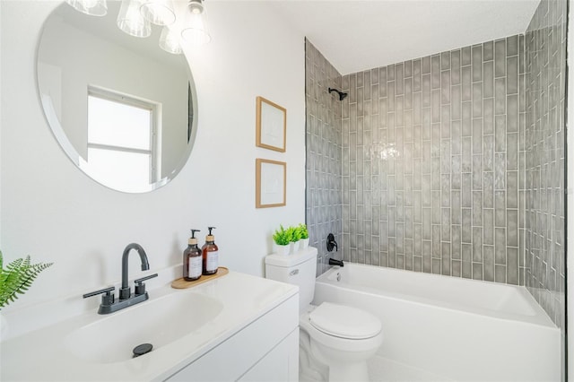 bathroom with vanity, toilet, and washtub / shower combination