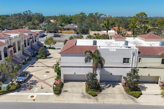 birds eye view of property with a residential view