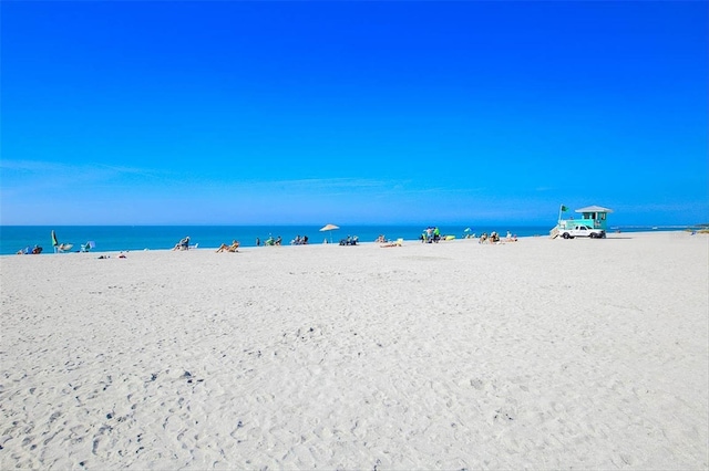 property view of water featuring a view of the beach