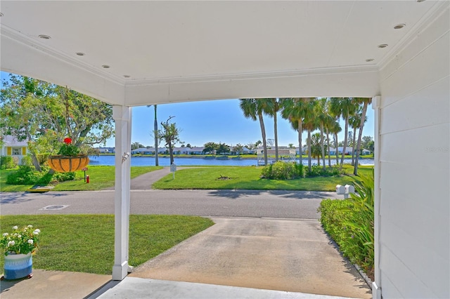 view of patio with a water view