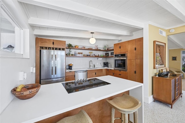 kitchen featuring beamed ceiling, open shelves, appliances with stainless steel finishes, a peninsula, and brown cabinetry