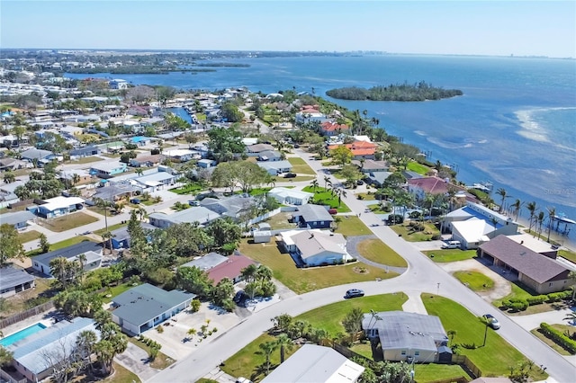 birds eye view of property featuring a residential view and a water view