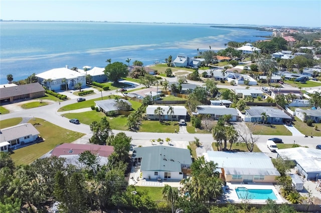 aerial view featuring a residential view and a water view