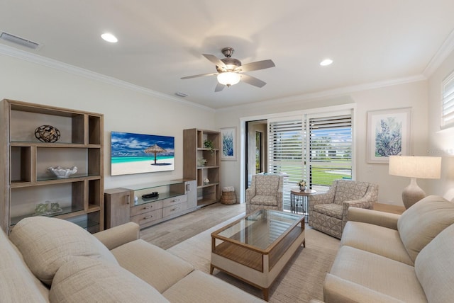 living room featuring recessed lighting, a ceiling fan, light wood-type flooring, and ornamental molding