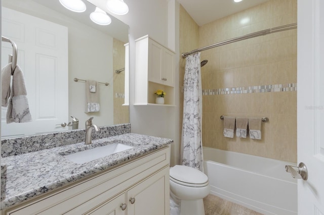 full bath with toilet, vanity, and shower / bath combination with curtain