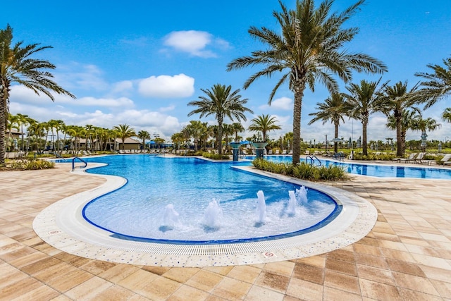 community pool featuring a patio