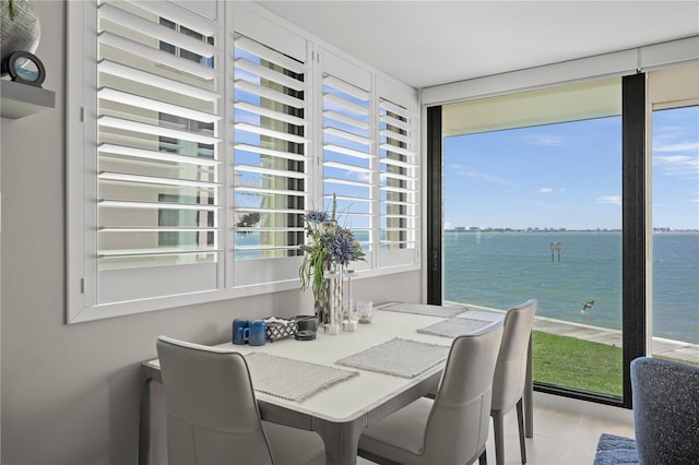 sunroom with a water view